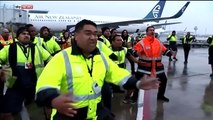 New Zealand World Cup Winners' Welcomed Home By Airport Staff Performing Haka
