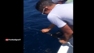 Man United’s Robin van Persie caught a massive shark whilst fishing