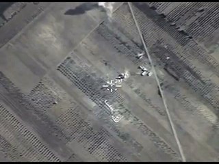 Les résultats des frappes aériennes de positions de tir équipe LIH dans le quartier d'Acan (CAD)