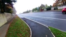 Cycle lane covered with leaves and debris from car crash