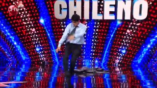 Oscar Reinoso breakdances out of his suit on Chileans Got Talent