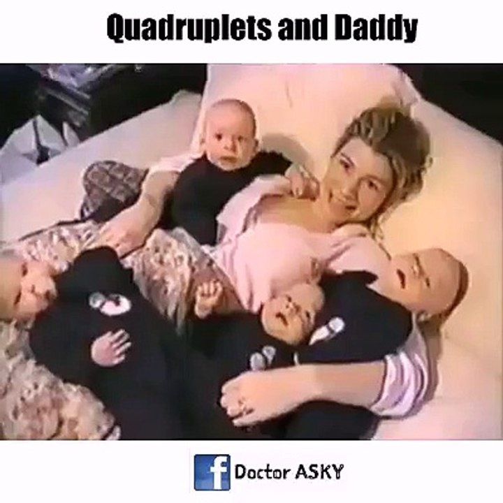 Quadruplets with mom and dad