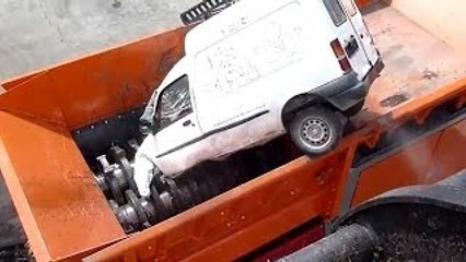 MACHINE DESTROYS CARS