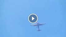 Video catches skydiver hanging from plane at 10,000 feet and surviving