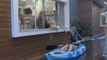 Australians take to flooded streets with kayaks and pool toys