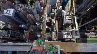 Crazy Urban Climbers on top of Skyscraper