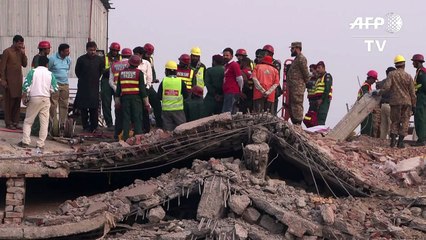 Rescuers search Pakistan factory rubble