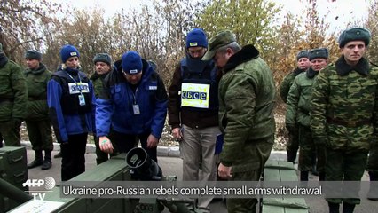 Ukraine rebels complete small arms withdrawal