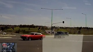White ute cuts off Police car to run red light
