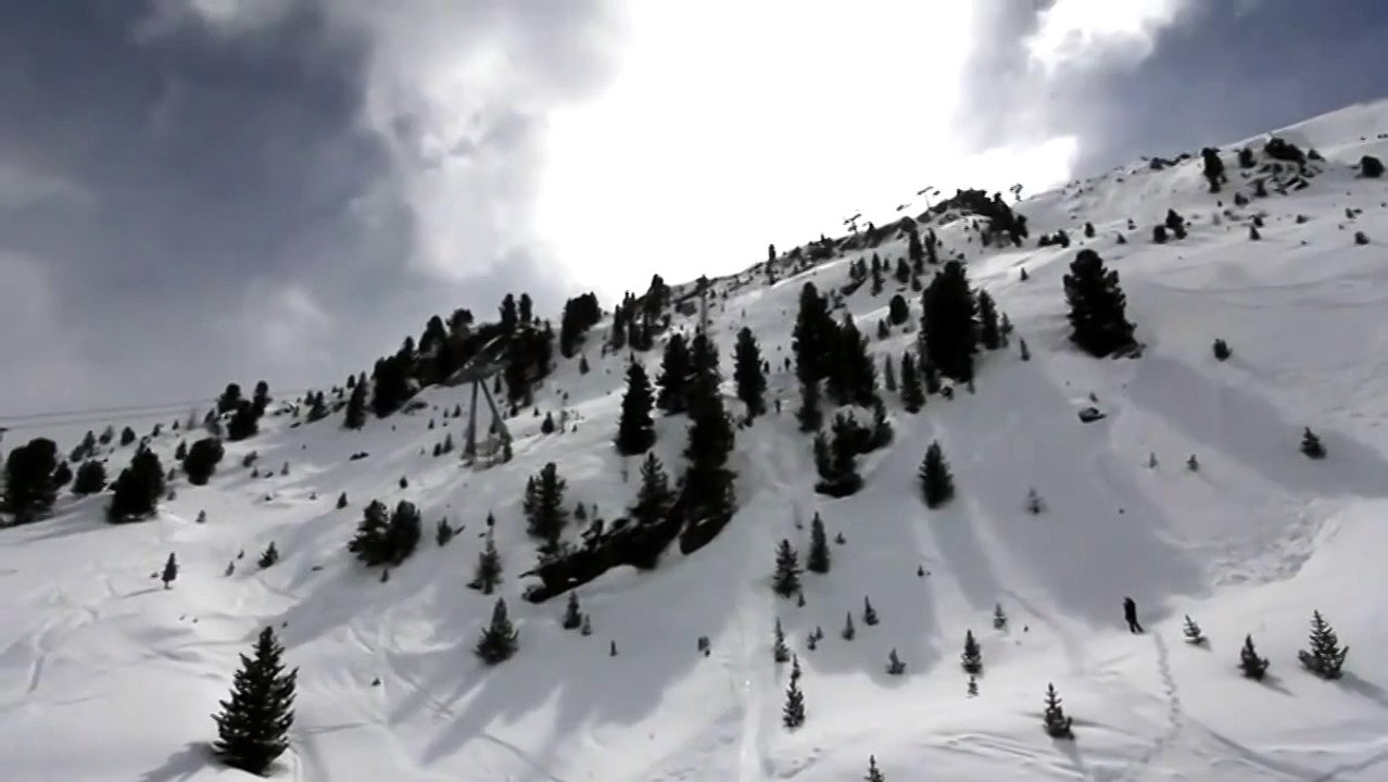 Snowboarder crashed into a rock