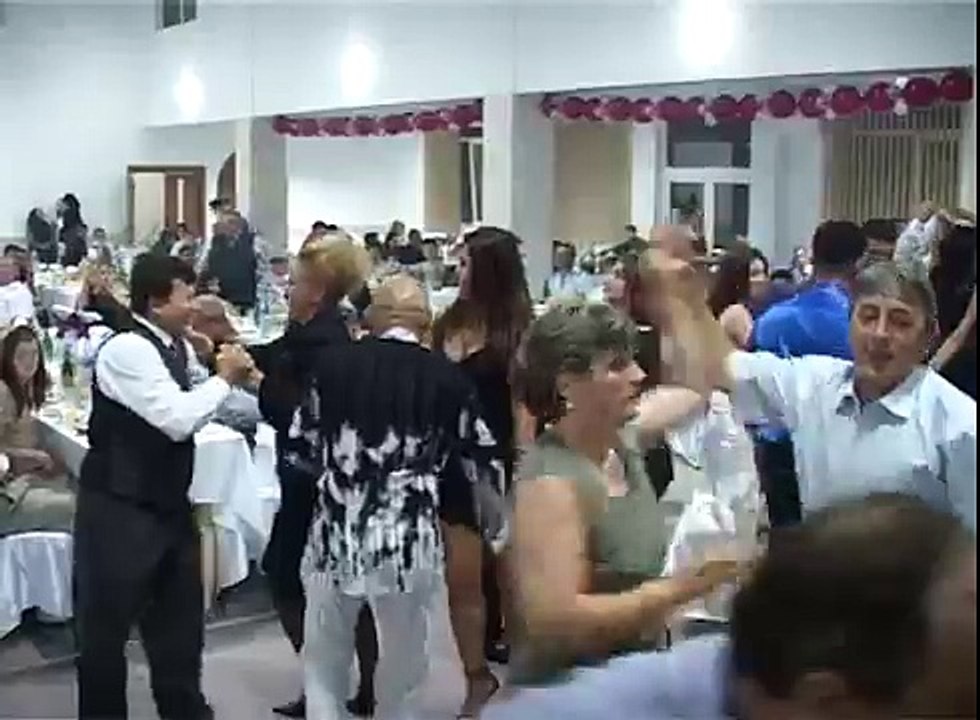 Husband Smacks His Wife and Keeps On Dancing