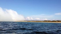 Huge wave fog in over lake