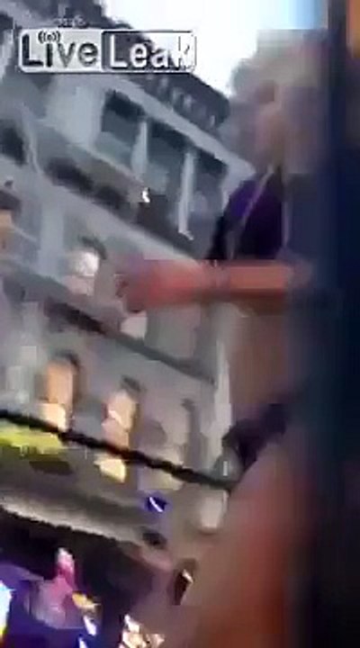 LiveLeak Shes Not a stripper! Man tries tipping a female dancer in a street parade