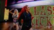 Becky Lynch (w/ Charlotte) vs. Brie Bella (w/ Team Bella)