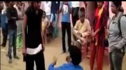Angry girl thrashes boy publicly