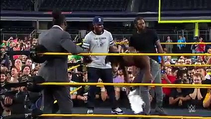 Booker T battles Brandon Carr in Spinaroonie-off  WrestleMania On-Sale Party, November 5, 2015
