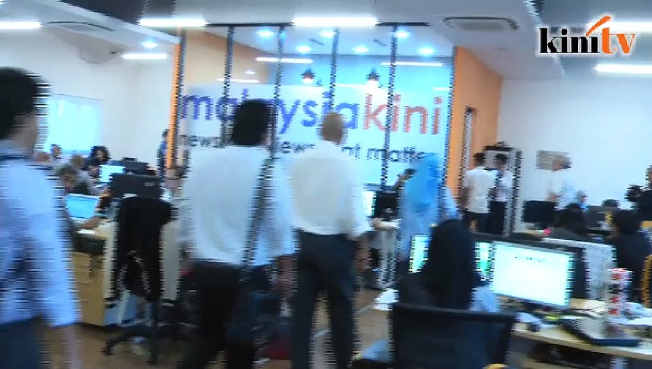 Cops, MCMC seize another computer in second visit to M'kini