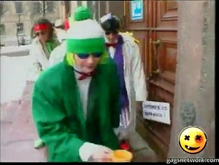 Seven Clowns in White Raincoats Caution Wet Paint