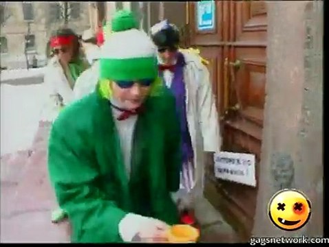 Seven Clowns in White Raincoats Caution Wet Paint