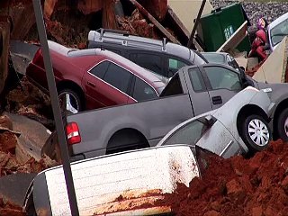 Mississippi car park cave-in swallows 12 cars