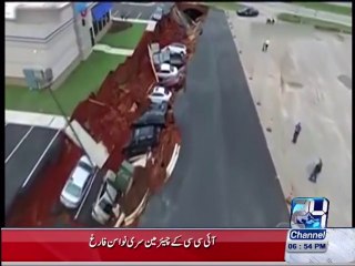 Giant hole swallows 12 vehicles in Mississippi restaurant parking lot