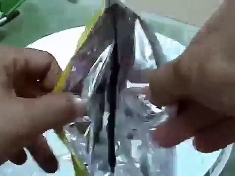DIY Solar Death Ray made with crisps bags. Solar cooking