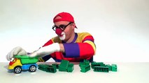 Toy Car Clown's LEGO Dinosaur - Jurassic TRUCK Chase! Toys & Trucks Cartoons for Kids by KidsFirstTV
