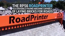 This amazing road building machine rolls out brick lanes like a carpet