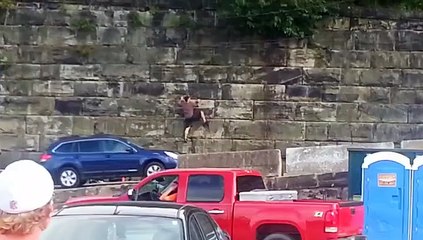Drunk Tailgater Falls From a Wall at Browns Stadium-Funny Entertainment Videos-by Funny Videos Collection