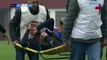 Romanian medics drop an injured player
