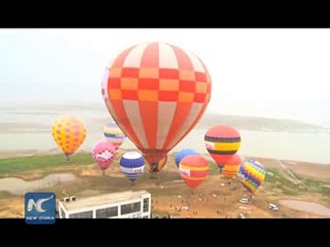 Hot air balloon competition over Chinas largest fresh water lake