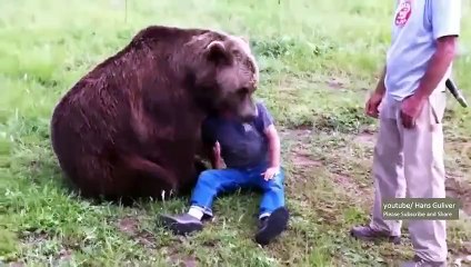 men fighting bear in russia