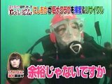 A Japanese girl dive among jellyfish in full face mask