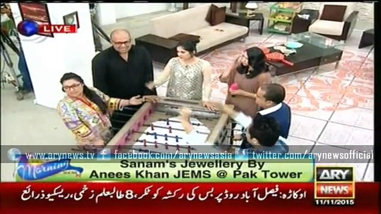 Sanam Baloch playing Foosball