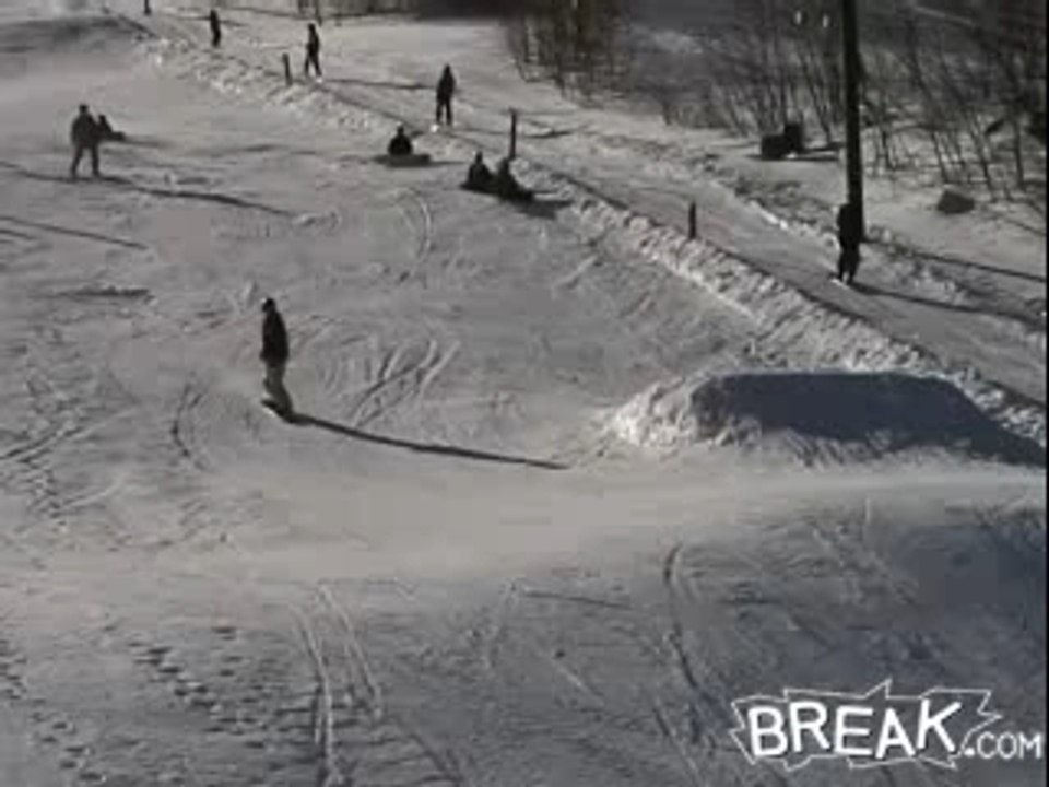 Régis fait du snowboard