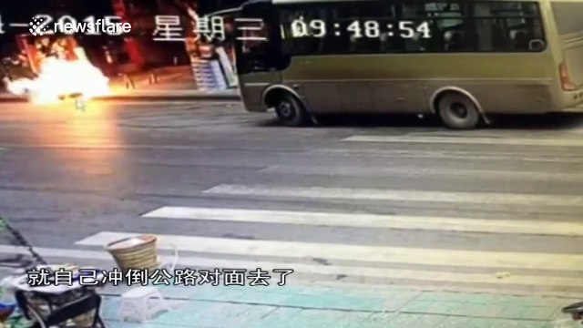 Burning gas cylinder rolls around wildly and sets fire to bus