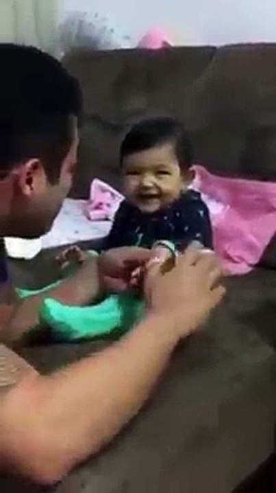 Funny baby with Father