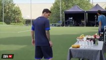 Messi doing keepy uppies with an orange