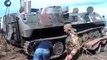 Ukraine War Militia fighters take armored vehicles captured from the Ukrainian military