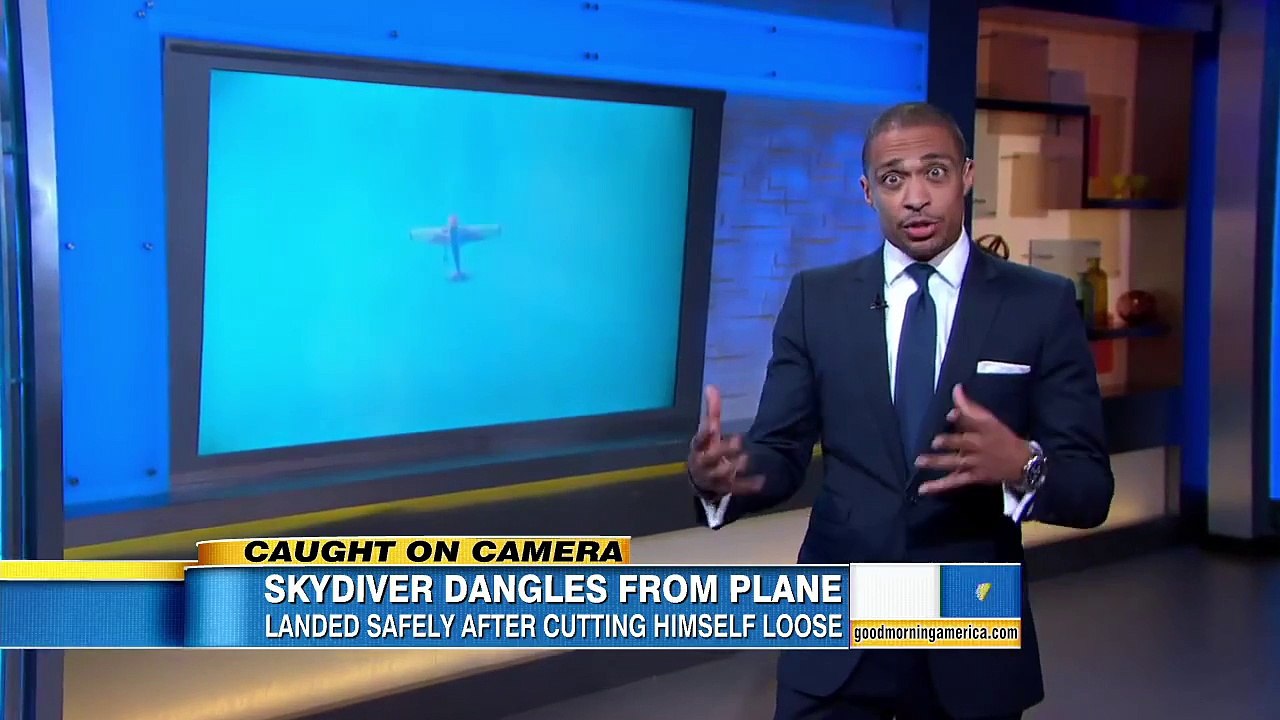 Skydiver Stuck When Jumping From Plane