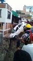 Stupid Tow Truck Driver drops back rescued Car in Hole!