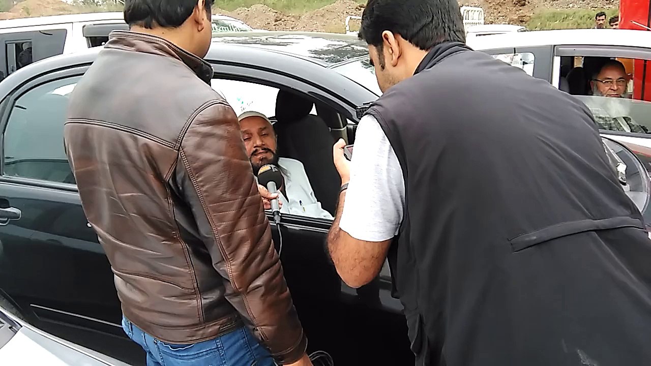 Media is taking interview during trafic jAm