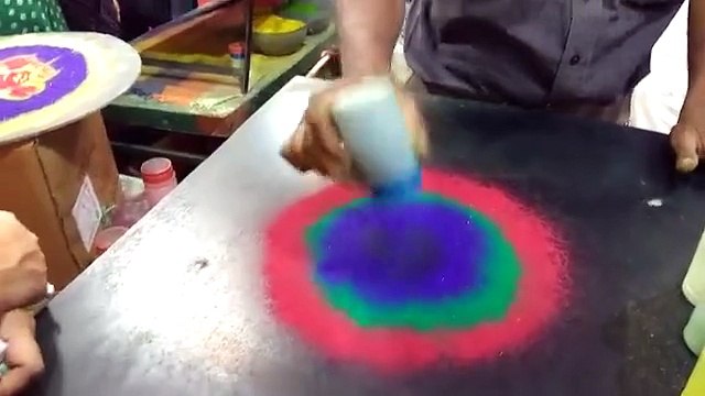 Réalisation d'une magnifique peinture rangoli