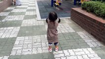 This cute little Girl can't stop laughing at her squeaking shoes