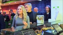 George Clooney visits a charity delicatissen in Scotland -