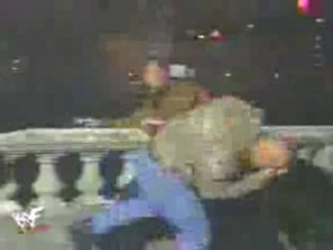 The Rock Throws Stone Cold off a Brigde