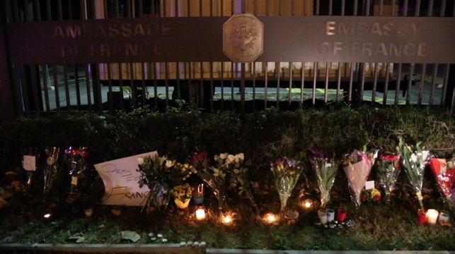 Mourners gather outside D.C.'s French Embassy