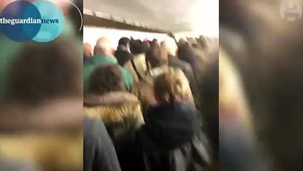 Football fans sing La Marseillaise during stadium evacuation – video - World news - The Guardian