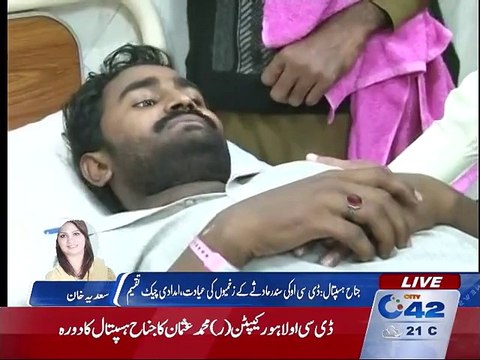 DCO visits Jinnah hospital and distributed relief checks among Sundar affectees