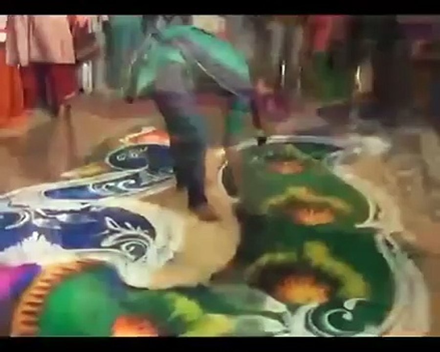 desi girl nice rangoli design